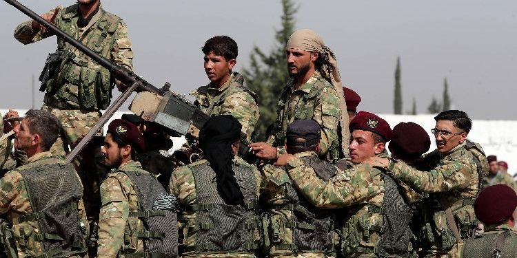 تقرير تركي يرصد تجنيد الأطفال في الجيش السوري الحر