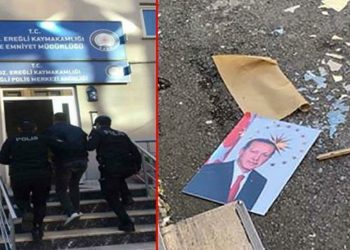 اعتقال تركي ألقى صورة أردوغان على الأرض